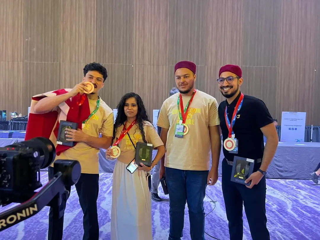 The TEK-UP team with their medals after the Computing Track final